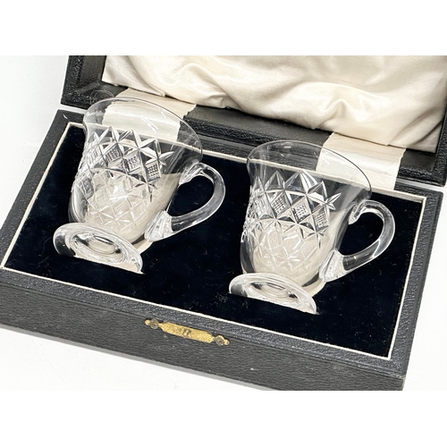 267 - A pair of Early 20th Century diamond crystal cups with case. 8x6.5x7cm.