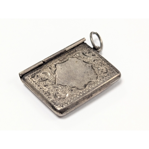 625 - An Early 20th Century silver stamp holder / pendant.