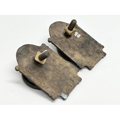 237 - A set of Early/Mid 20th Century bronzed brass door pulls and matching door knocker. 12x18cm. 16cm