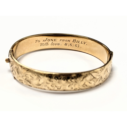 638 - A rolled gold bangle.