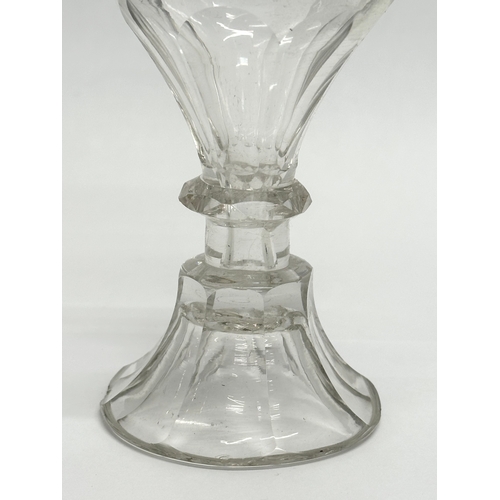 240 - An 18th Century George II wine glass/rummer with moulded stem. Circa 1727-1760. 13cm.