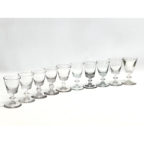 245 - A set of ten 18th Century George III glass wine glasses/rummers. Circa 1760-1780. 11cm. 10cm.