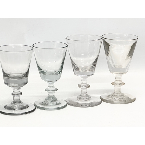 245 - A set of ten 18th Century George III glass wine glasses/rummers. Circa 1760-1780. 11cm. 10cm.