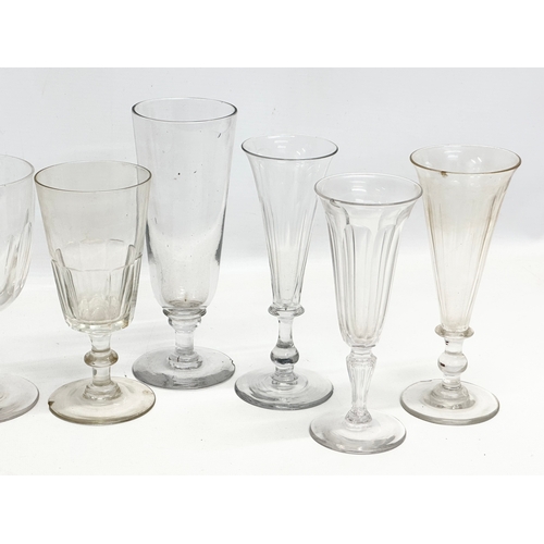 256 - 8 large 19th Century Victorian ale glasses. 20cm. 18cm. 17cm. Damaged.