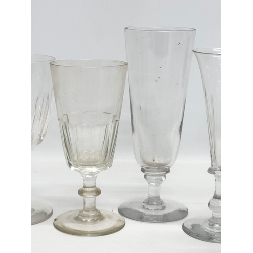 256 - 8 large 19th Century Victorian ale glasses. 20cm. 18cm. 17cm. Damaged.