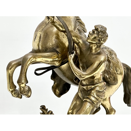 15 - A pair of excellent quality 19th Century Marly Horses on slate and brass bases. After Guillaume Cous... 