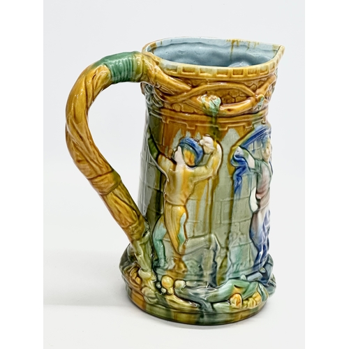 393 - A Majolica water jug. Minton style. 22x15x24cm.