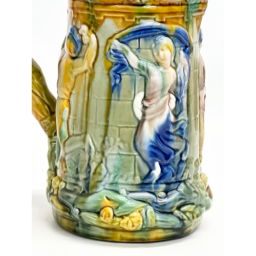 393 - A Majolica water jug. Minton style. 22x15x24cm.