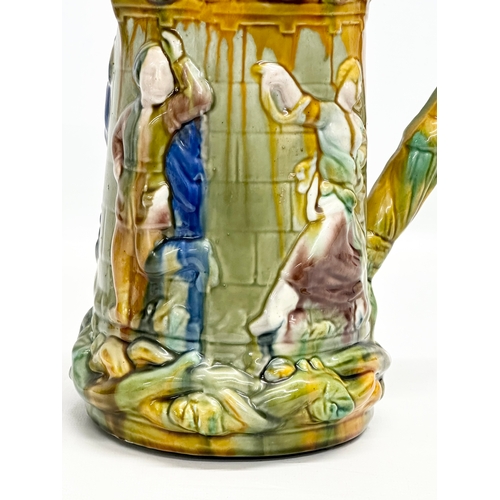 393 - A Majolica water jug. Minton style. 22x15x24cm.