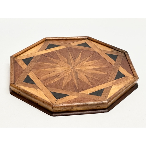 261 - A Mid 19th Century marquetry inlaid tabletop centrepiece. 31x31cm.