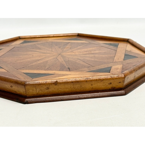 261 - A Mid 19th Century marquetry inlaid tabletop centrepiece. 31x31cm.