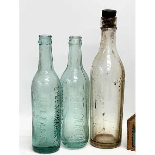 533 - A quantity of collectables. 19th and Early 20th Century. 3 Belfast glass bottles, McLennan. Apotheca... 