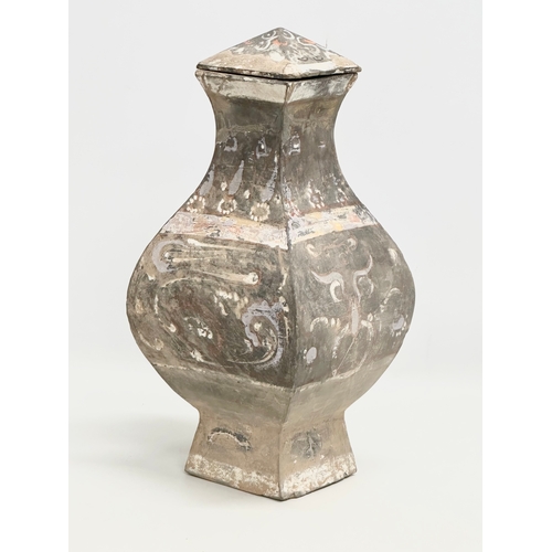 7 - Han Dynasty (206BC-220AD) A large Chinese Fanghu vase with cover. With watercolour painted details o... 