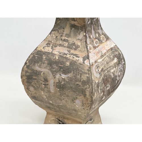 7 - Han Dynasty (206BC-220AD) A large Chinese Fanghu vase with cover. With watercolour painted details o... 