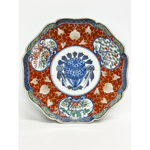 209 - 4 Imari plates. Including a set of 3 scalloped rim Imari plates with Ming 6 character mark and a Lat... 