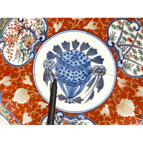 209 - 4 Imari plates. Including a set of 3 scalloped rim Imari plates with Ming 6 character mark and a Lat... 