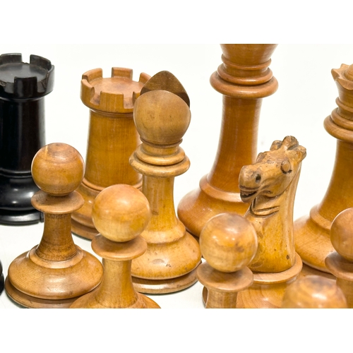 42 - Staunton Chess Set. A complete Late 19th Century weighted hand made “Staunton” chess set. With red c... 