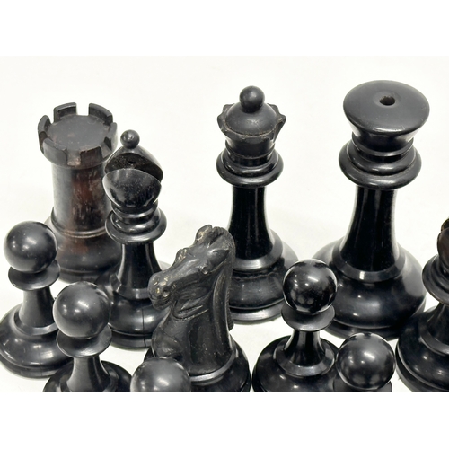 42 - Staunton Chess Set. A complete Late 19th Century weighted hand made “Staunton” chess set. With red c... 