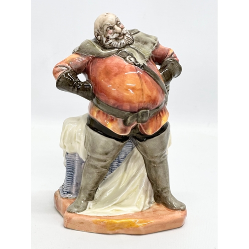 566 - Royal Doulton Falstaff. A figurine, a Dewar’s Whisky bottle and a jug.