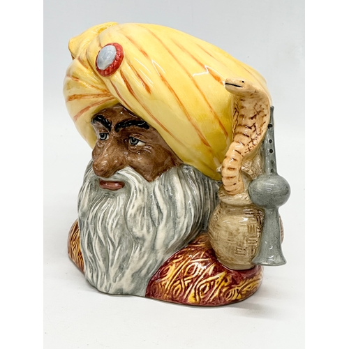 567 - A Royal Doulton “The Snake Charmer” character jug. Limited Edition 1744/2,500. D6912. 21x17x18cm.