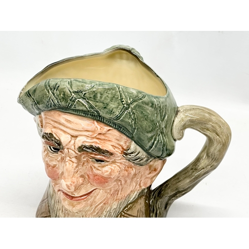 569 - A rare Royal Doulton “Auld Mac” musical character jug. The Campbells Are Coming. 19x12x16cm.