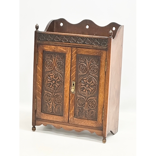 258 - A Late 19th Century tabletop/wall hanging oak smokers cabinet. With pipe and original humidor. 33x17... 