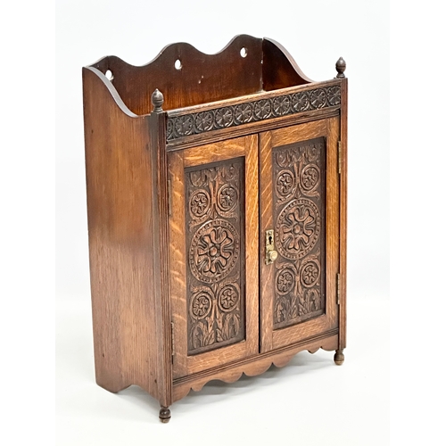 258 - A Late 19th Century tabletop/wall hanging oak smokers cabinet. With pipe and original humidor. 33x17... 