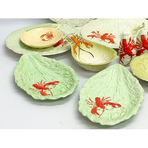 577 - A set of Carlton Ware Lobster pattern table ware. Platter 44cm. Serving dishes, toast rack, salt and... 