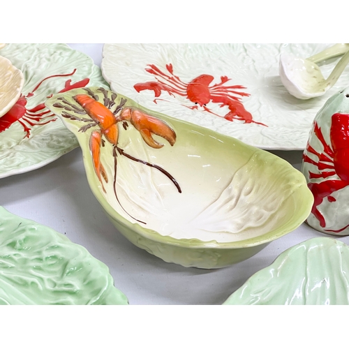 577 - A set of Carlton Ware Lobster pattern table ware. Platter 44cm. Serving dishes, toast rack, salt and... 