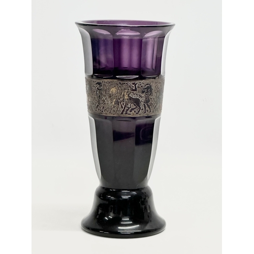 62 - Moser Karlsbad. A signed 1920’s Czech amethyst glass vase, with gilt panel depicting a mythical batt... 