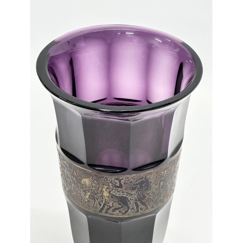 62 - Moser Karlsbad. A signed 1920’s Czech amethyst glass vase, with gilt panel depicting a mythical batt... 