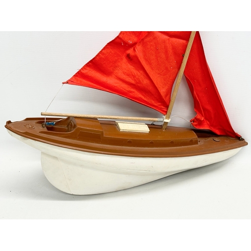 733 - A vintage plastic pond yacht. 41x48cm