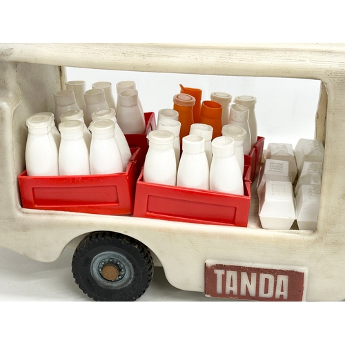 734 - A vintage child’s ride on Tanda milk float truck. 57cm