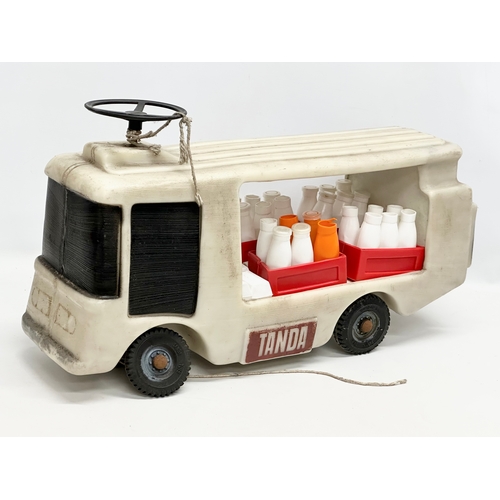 734 - A vintage child’s ride on Tanda milk float truck. 57cm