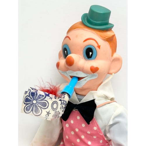 743 - A vintage clown doll. 38cm