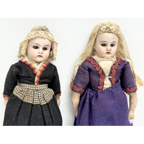 745 - 2 Early 20th Century bisque dolls. 1900-1910. 26cm