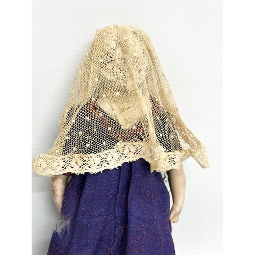 745 - 2 Early 20th Century bisque dolls. 1900-1910. 26cm