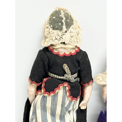 745 - 2 Early 20th Century bisque dolls. 1900-1910. 26cm