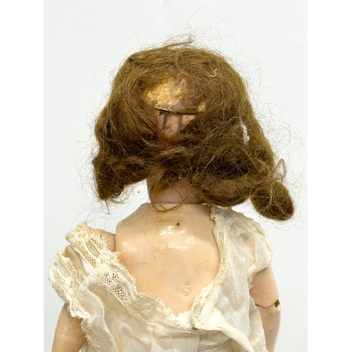 749 - Recknagel. An Early 20th Century German bisque doll by Recknagel. 1900-1915.