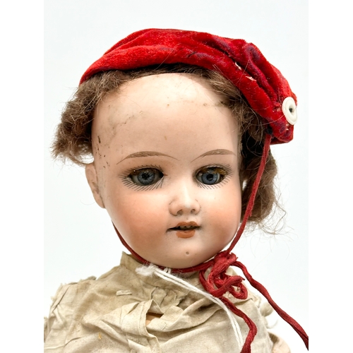 750 - An Early 20th Century Armand Marseille bisque dolls parts. 1900-1915.