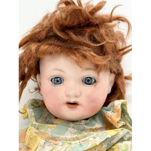 751 - An Early 20th Century German bisque doll by Armand Marseille. 46cm