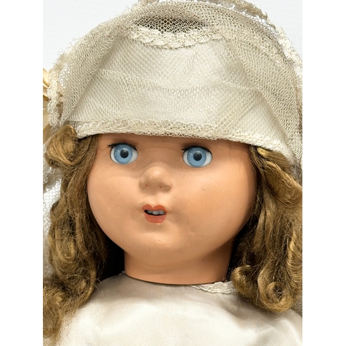 752 - A 1950’s Wilkinson & Gross “Cinderella No.3” talking doll. 55cm