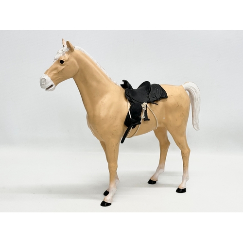 761 - 3 vintage dolls horses by Marx and Sindy.