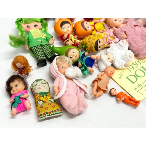 762 - A collection of 1960’s/70’s small and miniature dolls.