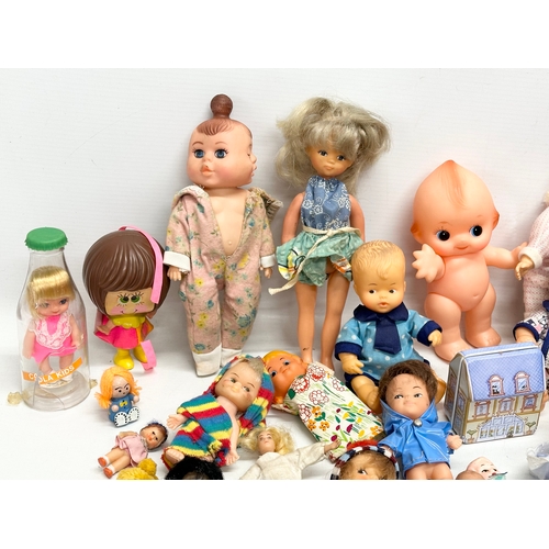 762 - A collection of 1960’s/70’s small and miniature dolls.