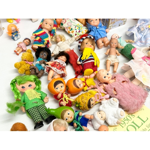 762 - A collection of 1960’s/70’s small and miniature dolls.