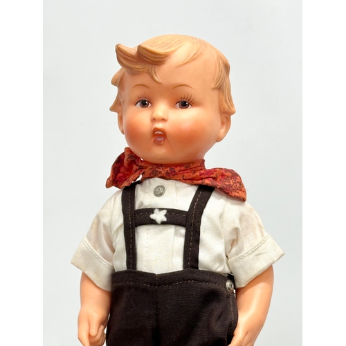 763 - A 1950’s Goebel Hummel rubber doll. 18cm