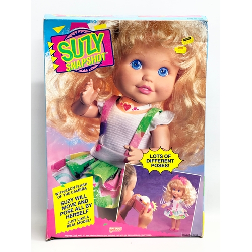 768 - A Galoob Suzy Snapshot Doll with box and accessories.