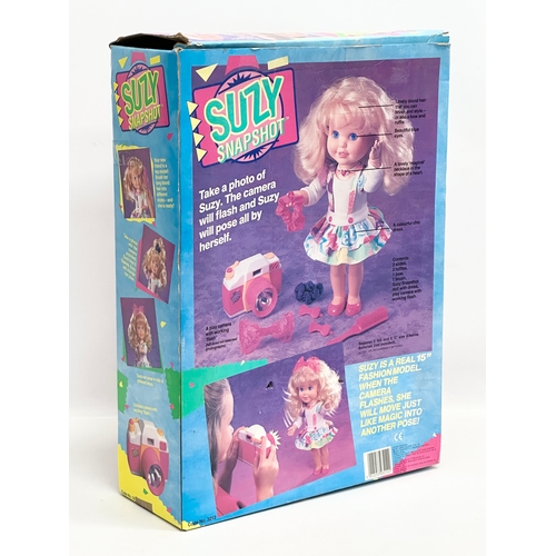 768 - A Galoob Suzy Snapshot Doll with box and accessories.