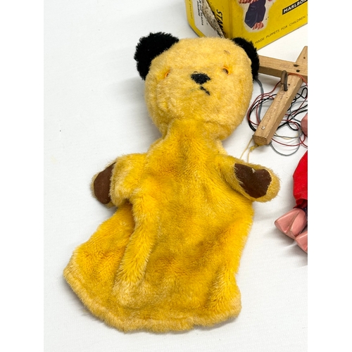 774 - Vintage puppets. A 1960’s Chad Valley Sooty hand puppet. 2 Perky Pelham Puppets with boxes.